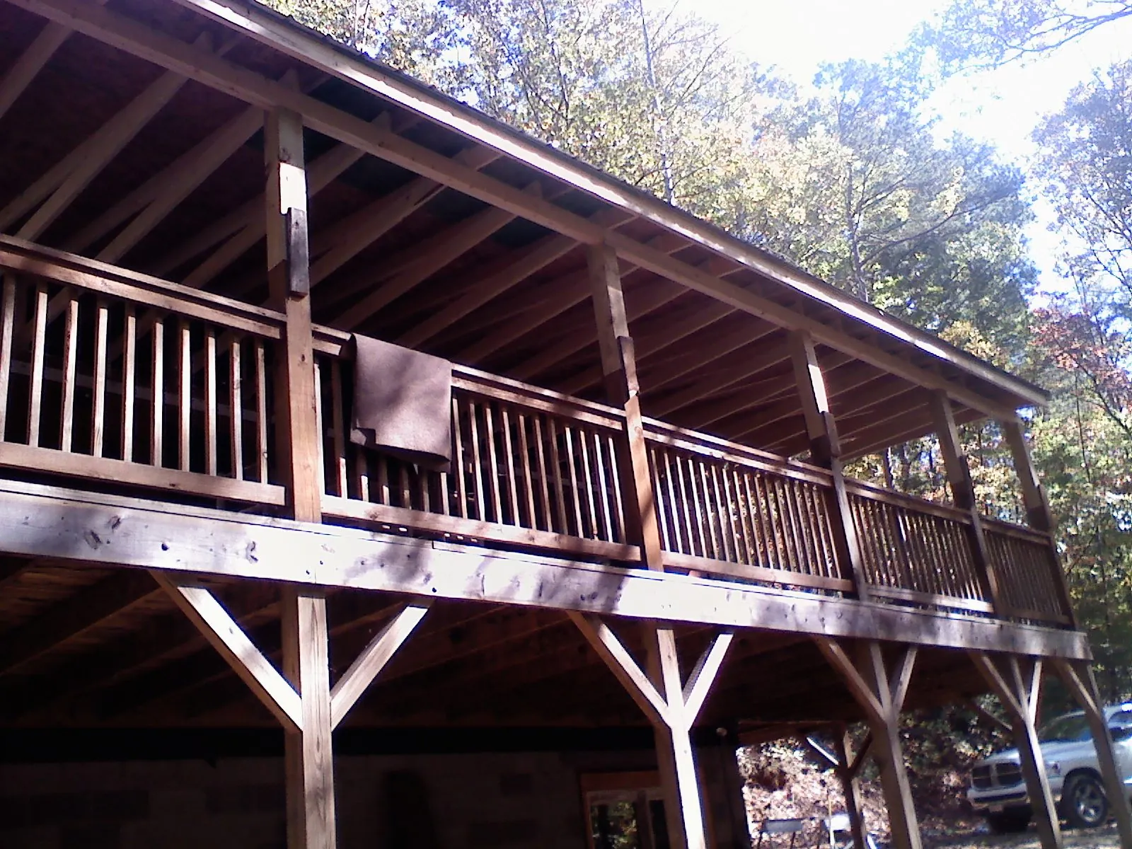 Timber framing under a new elevated porch and deck — Roof Leak Repair in Valley Center by Roofing Brothers